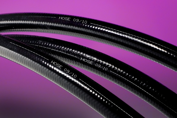 Two black hoses with 09/10 markings.