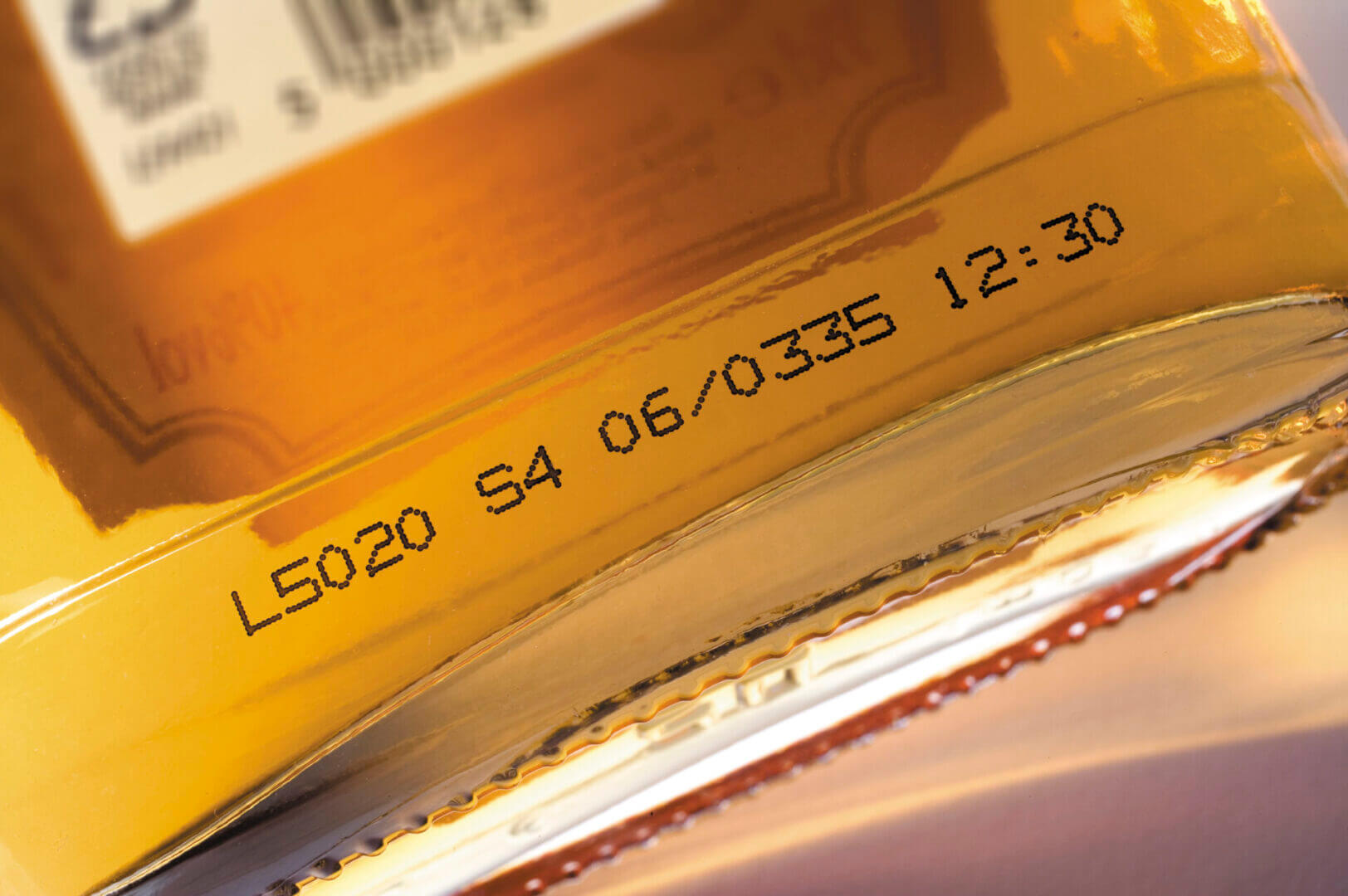 Close-up of a bottle's lot code.