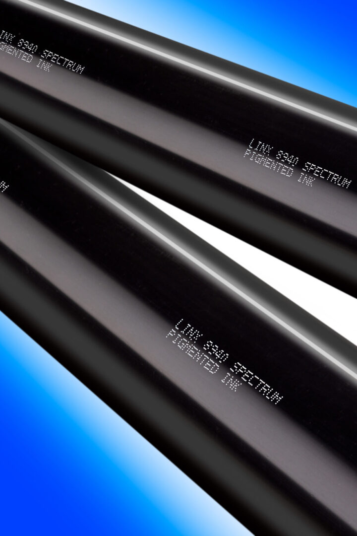Black ink cartridges with white text.
