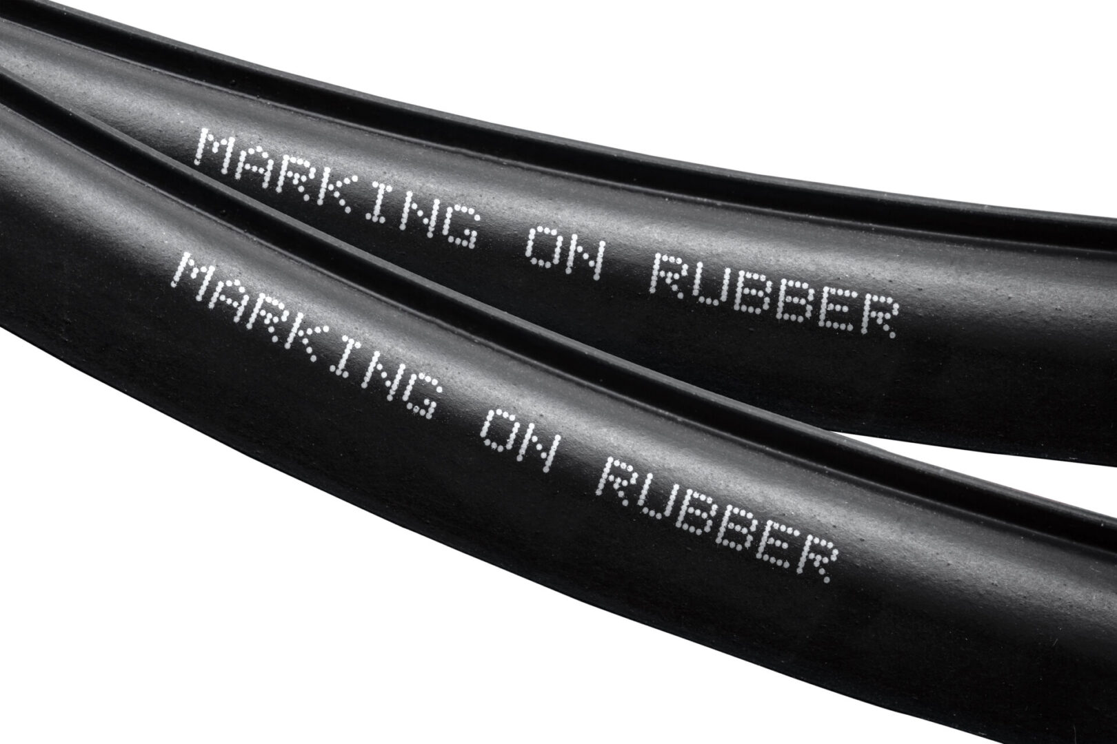 Two black rubber hoses with markings.